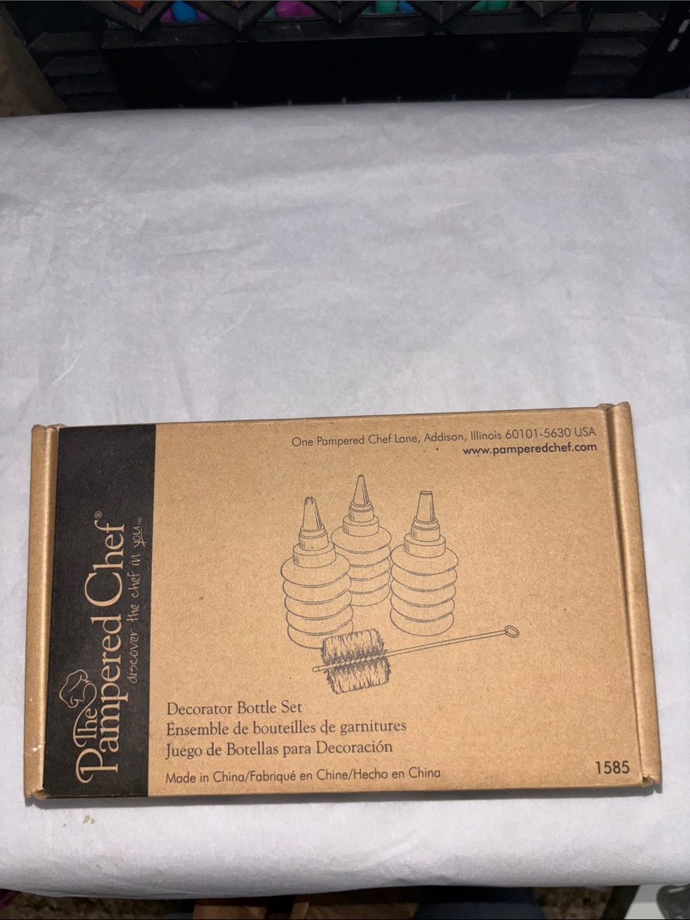 The Pampered Chef Decorator Bottle Set in Brown and Black Packaging